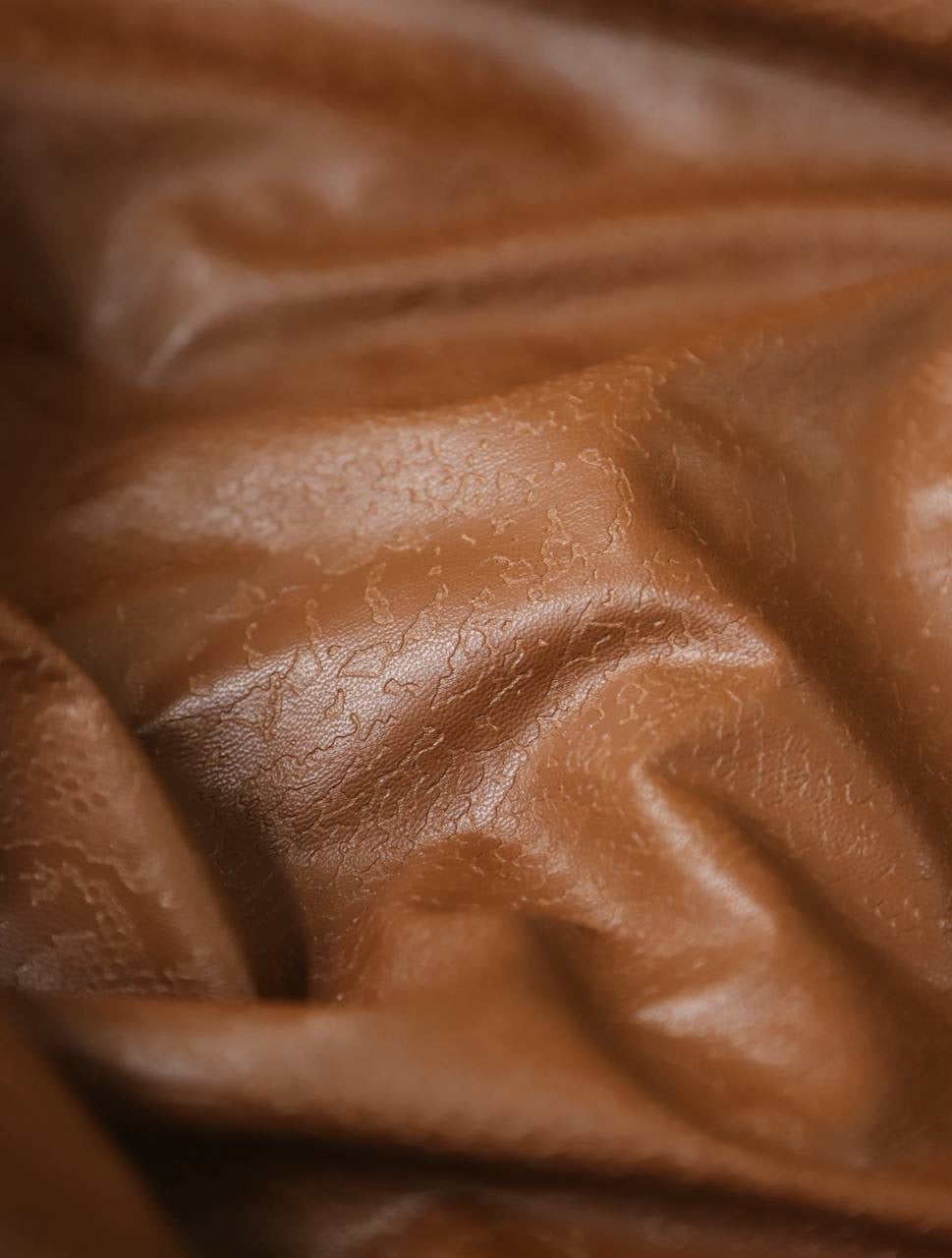 Deri kendinden desenli