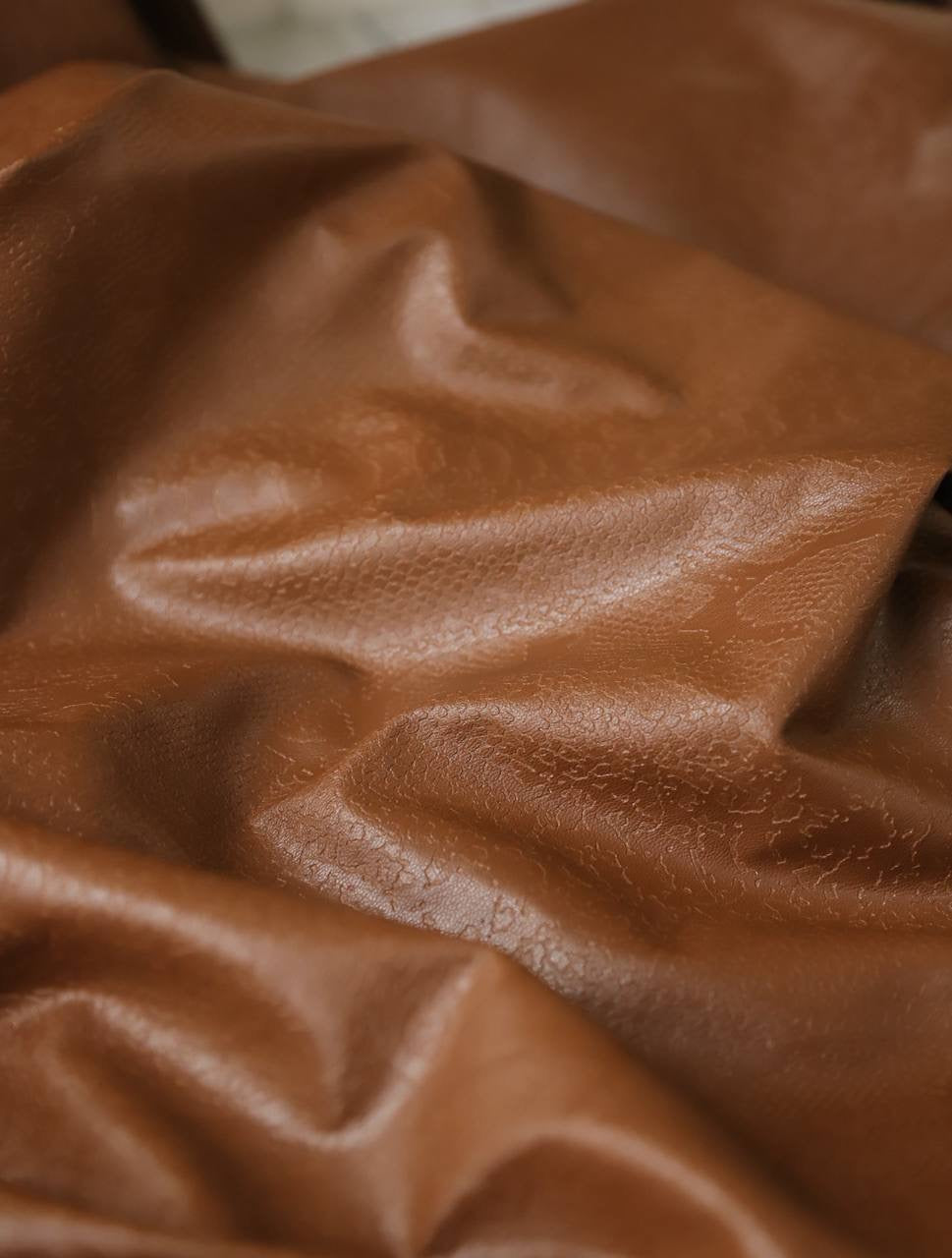 Deri kendinden desenli